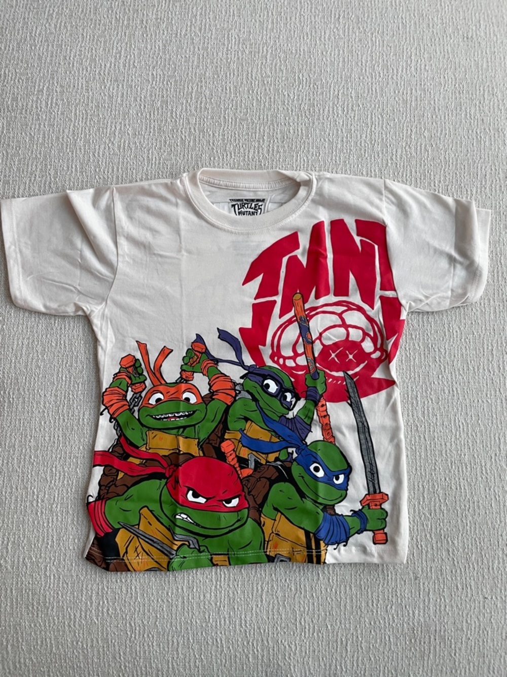 Nickelodeon Kids NWOT TMNT Off White Graphic Tee with Red, Green, Blue Accents